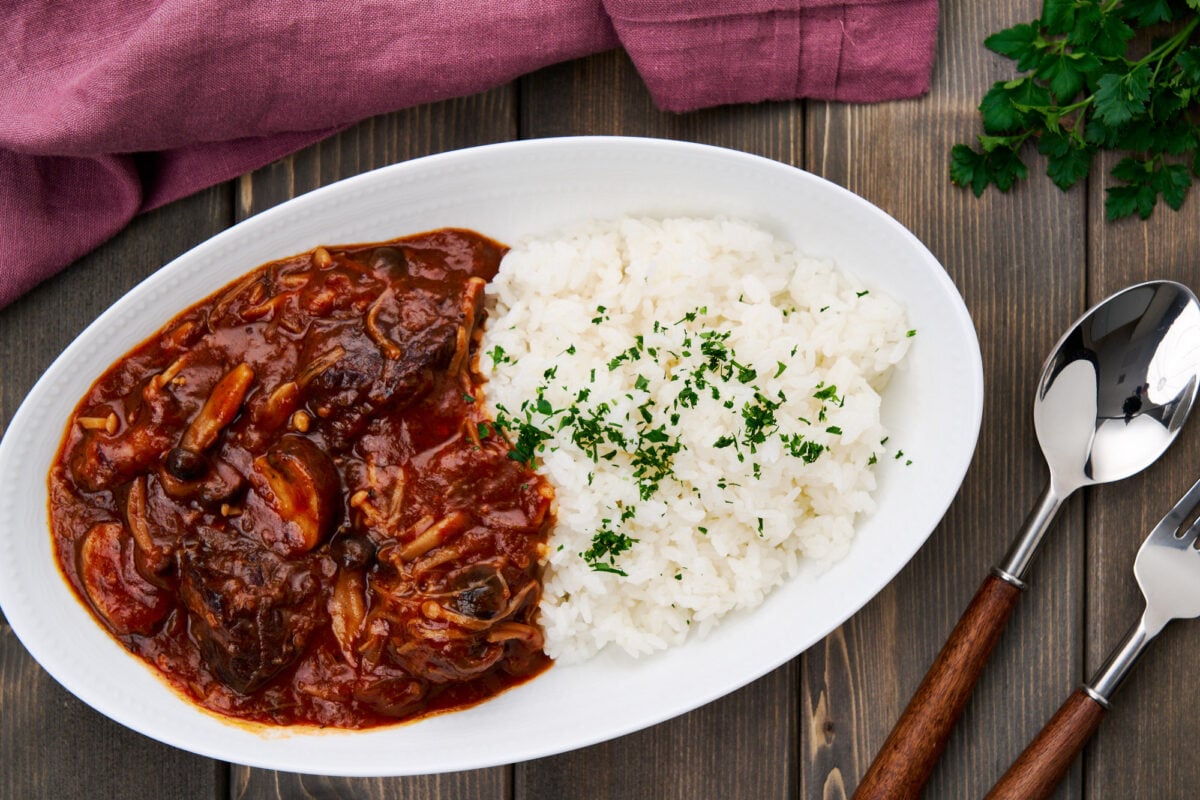 Hayashi rice with tender cubes of beef stewed with mushrooms and onions in a savory, sweet, and tangy sauce served with rice.