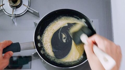 Making roux in a frying pan.