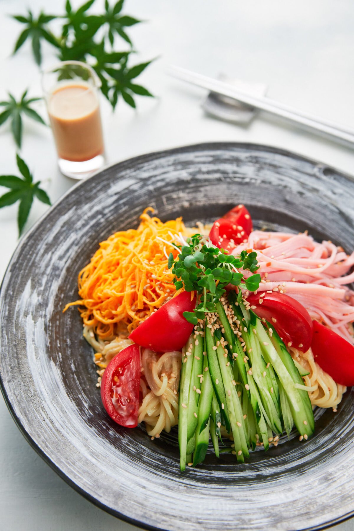 This cold ramen salad (Hiyashi Chuka) is the perfect light meal for a hot summer day. With loads of veggies and protein over a bed of chilled ramen noodles dressed with a creamy sesame vinaigrette, it's sure to wake your appetite on even the hottest of days.