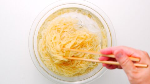 Chilling ramen noodles in a bowl of ice water.