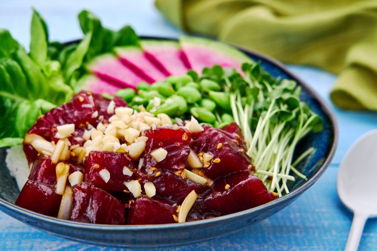 With flavorful Ahi Poke and a rainbow of colorful veggies on rice, this homemade poke bowl is a quick balanced meal.