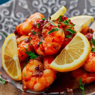 This easy honey garlic shrimp is coated in a mouthwatering sticky garlic glaze, and yet it comes together in minutes from just a handful of pantry staples.