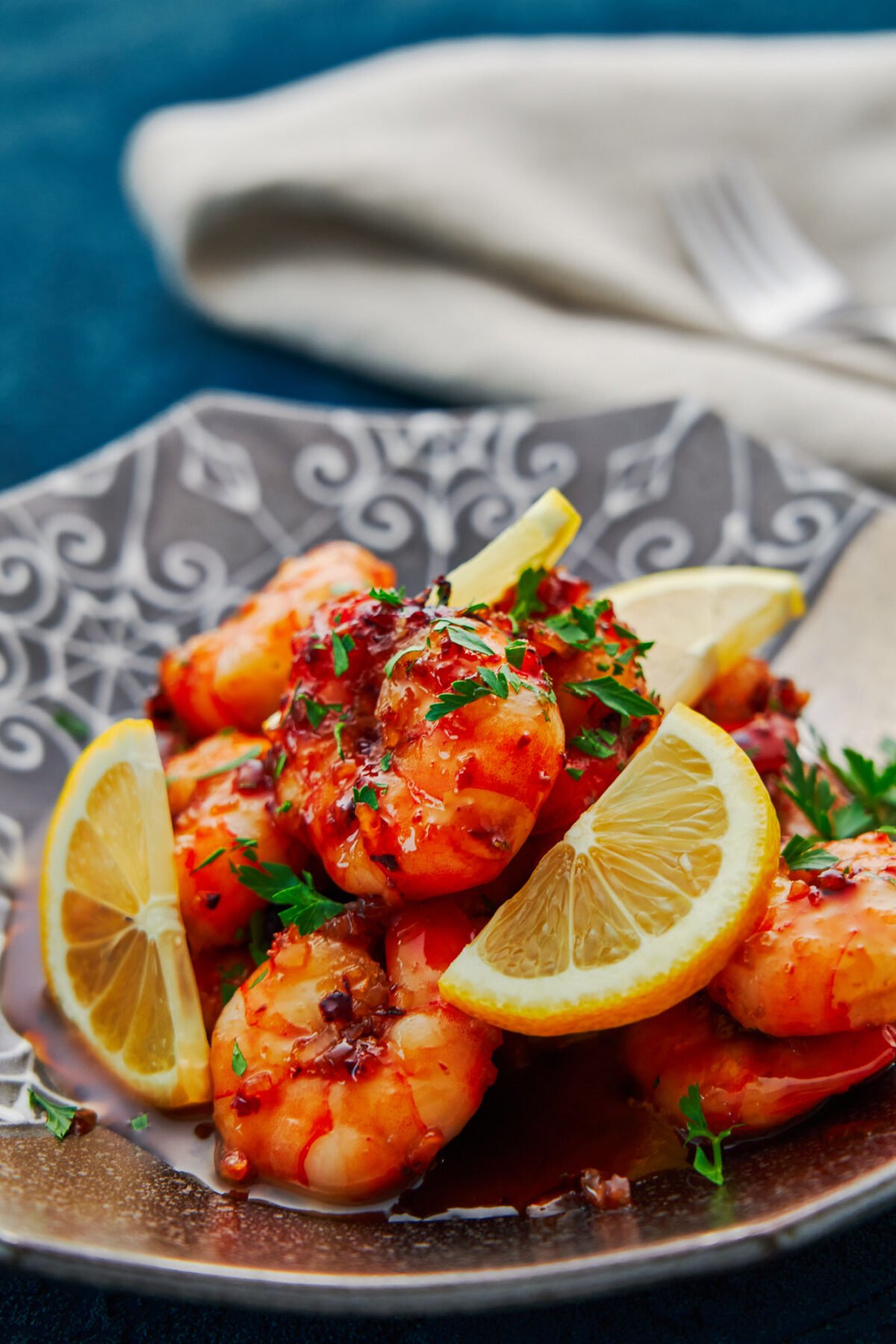 This easy honey garlic shrimp is coated in a mouthwatering sticky garlic glaze, and yet it comes together in minutes from just a handful of pantry staples.