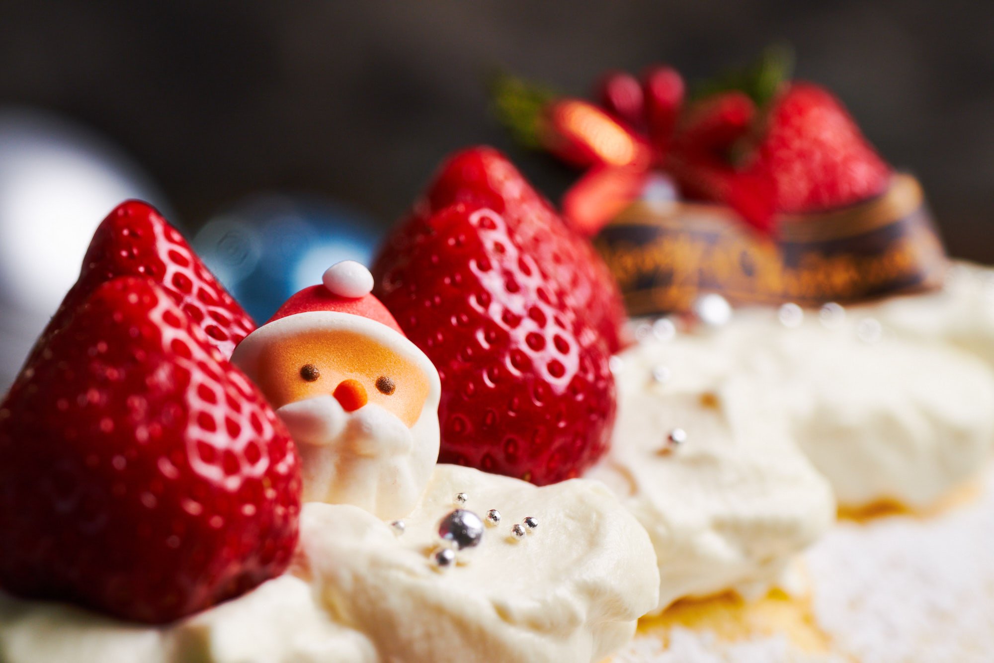 Japanese Christmas cake decorated with strawberries and Santa Claus.