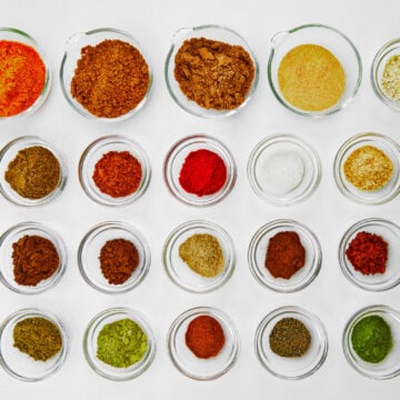 Lineup of the 20 spices used to make authentic Japanese curry powder.