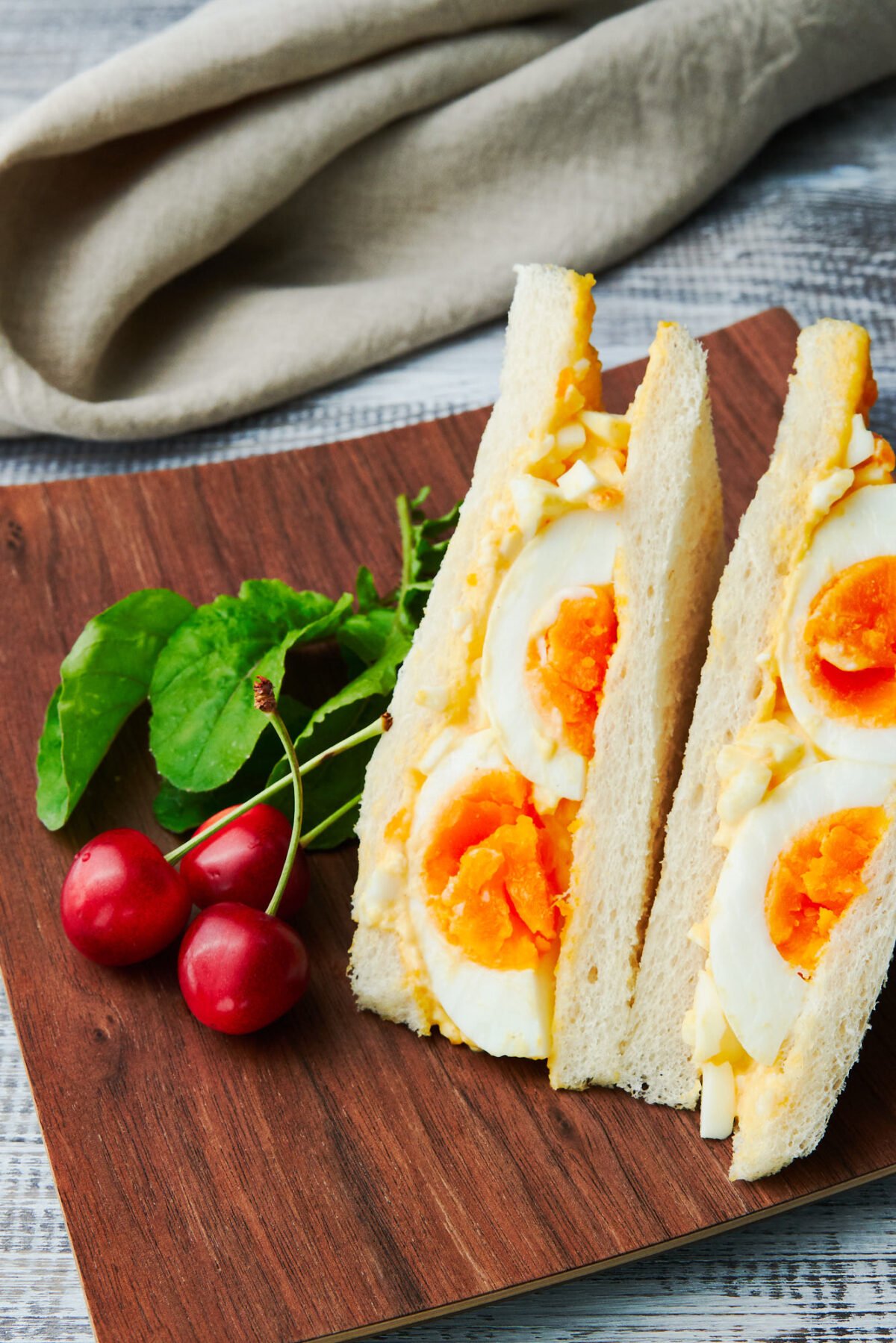 This protein packed Japanese egg salad sandwich recipe has a triple dose of eggs, packed with medium boiled eggs, egg salad, and mayonnaise.