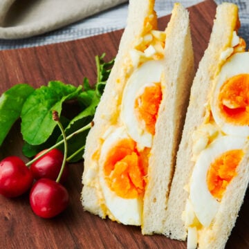 This protein packed Japanese egg salad sandwich recipe has a triple dose of eggs, packed with medium boiled eggs, egg salad, and mayonnaise.