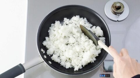 Stir-frying garlic rice.