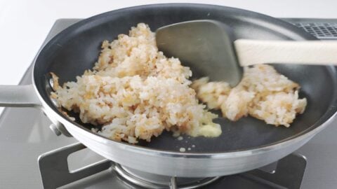 Garlic fried rice with garlic butter in a pan.