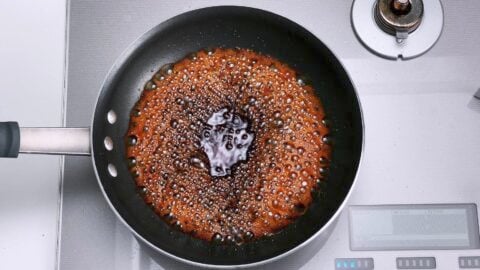 Caramelizing Teriyaki Sauce in a frying pan.