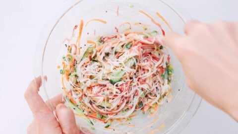 Mixing Kani Salad together.