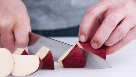 Cut the Japanese sweet potatoes at an angle.