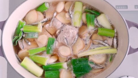 Pork belly, scallions, ginger, and niboshi braising.