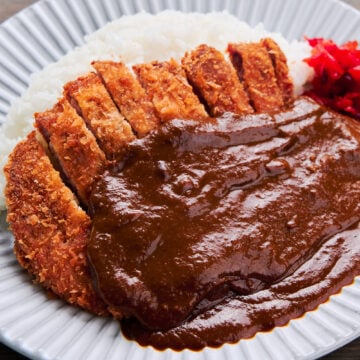 Katsu curry or cutlet curry is a classic Japanese comfort food made with a crispy pork cutlet sauced with rich Japanese curry sauce.