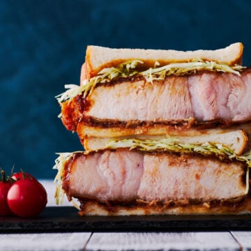 With thick juicy Tonkatsu doused in a sweet, spicy, savory and tangy sauce, this Katsu Sandwich recipe can be made at home with just a handful of ingredients.