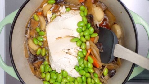 Tofu and edamame added to Japanese vegetable soup.