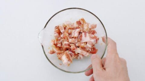 Marinating pork belly for kimchi pasta.