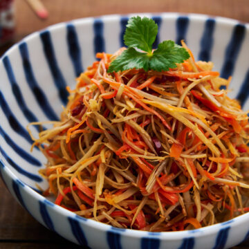 Kinpira Gobo is an easy Japanese side dish made by stir-frying shredded root vegetables with a sweet and savory sauce.