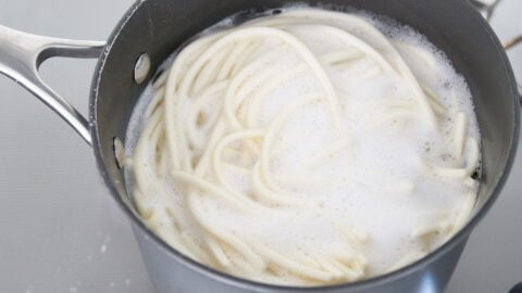 The udon noodles get boiled until al dente before being combined with the dashi broth to make kitsune udon.