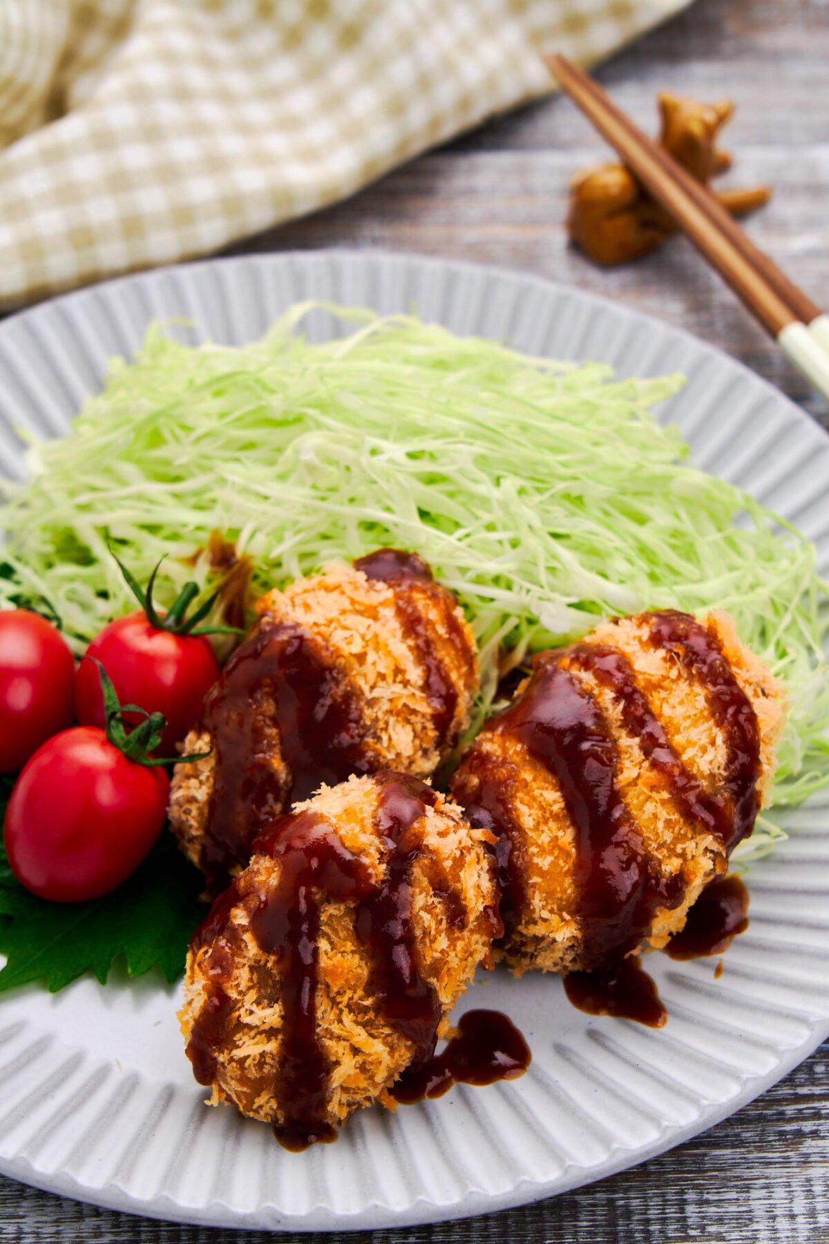 Japanese croquettes or korokke are filled with creamy mashed potatoes meat with a crispy panko shell on the outside.