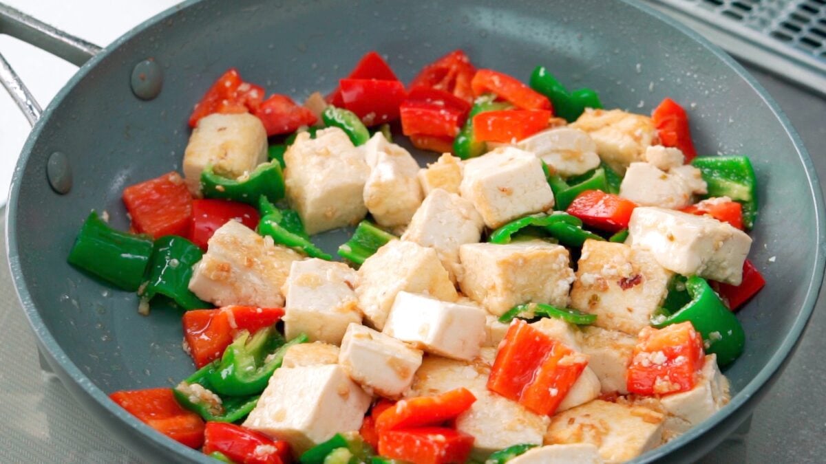 Tofu and bell peppers stir-fried before the Kung Pao Sauce goes in.