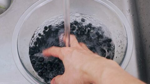 Washing black beans.