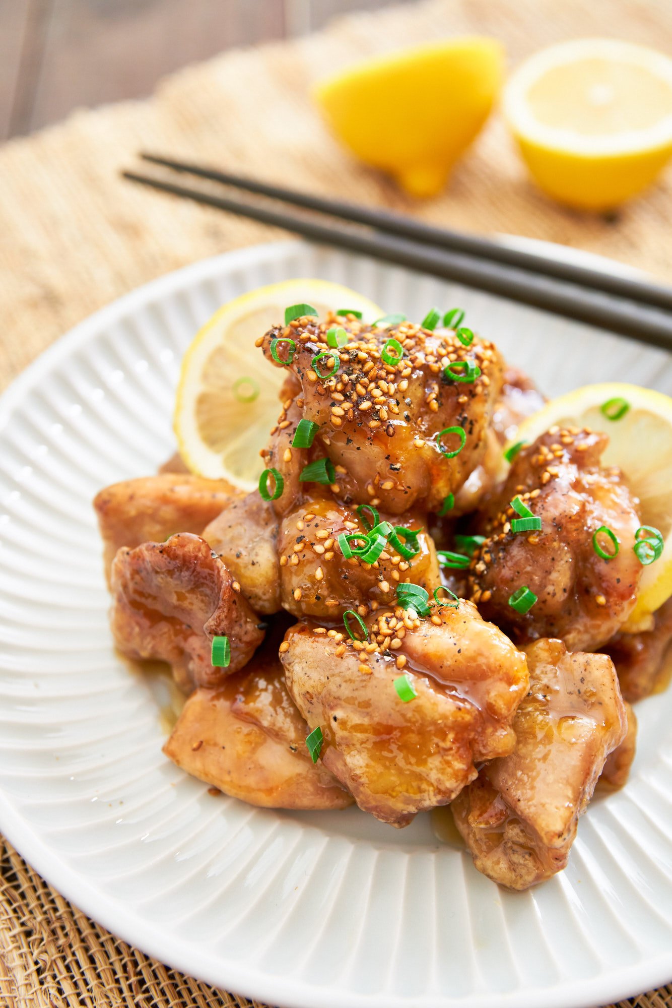 The best lemon chicken recipe with juicy chunks of savory chicken glazed in a sweet and tangy lemon sauce.