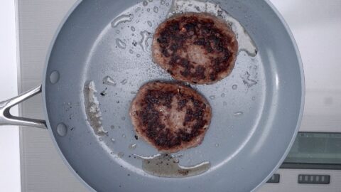 Frying burger patties for Loco Moco.