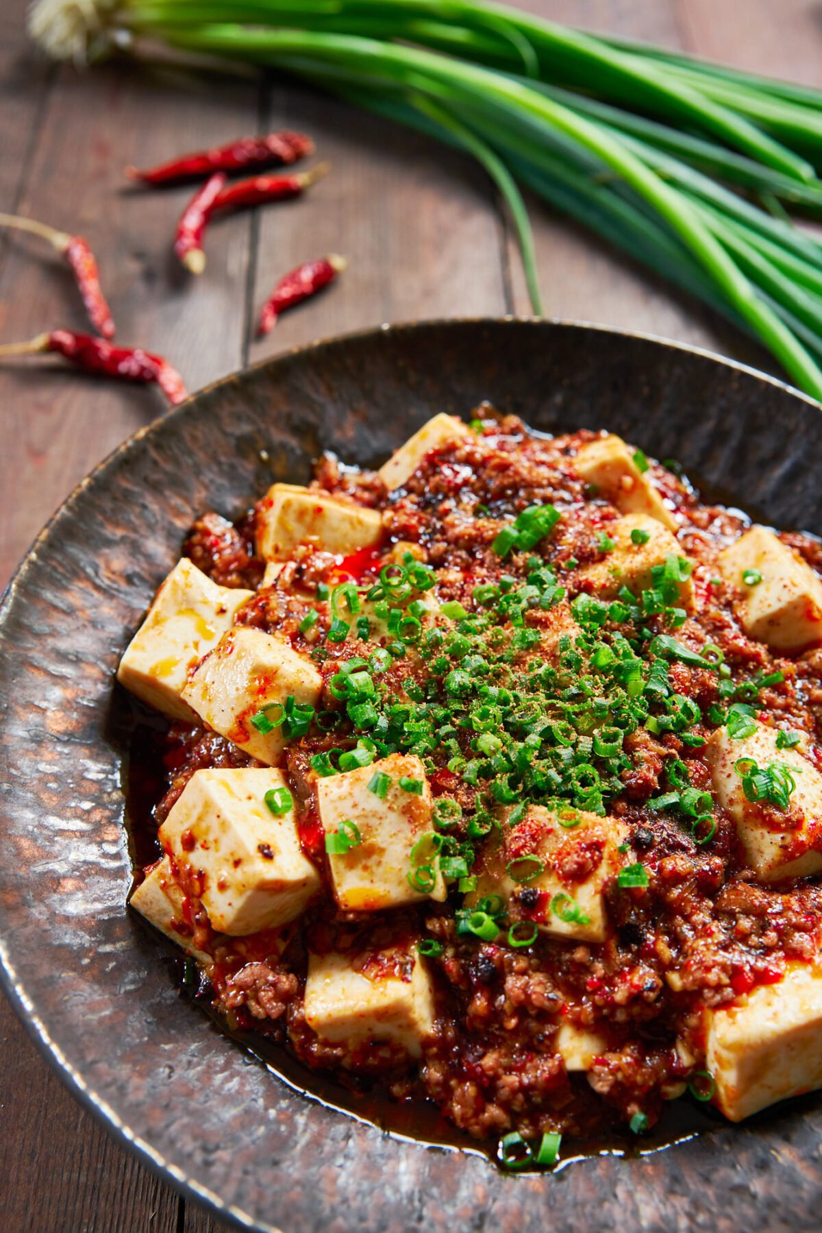 With custardy cubes of tofu draped in a tongue tingling spicy sauce, this Sichuan-style Mapo Tofu is the best tofu dish ever!