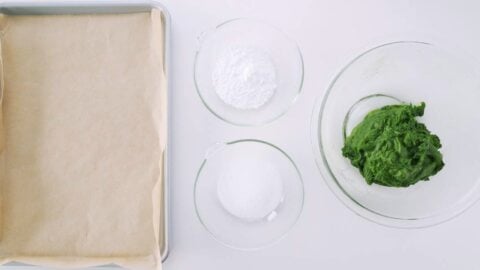 Setup for shaping matcha crinkle cookies.