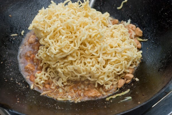 Noodles are added to the pan 