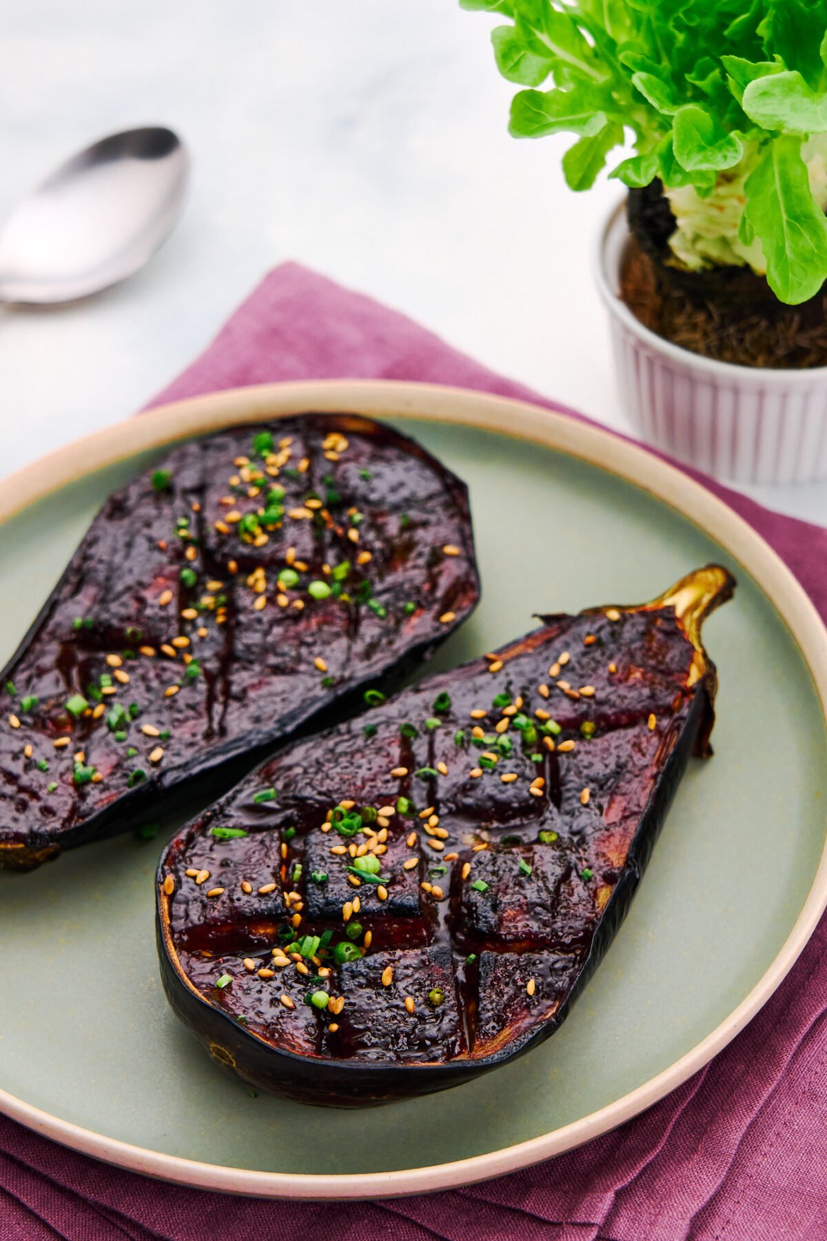 Tender creamy roasted eggplant finished with a sweet earthy miso glaze that's caramelized on top.