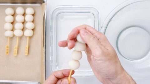 Skewing boiled dango.