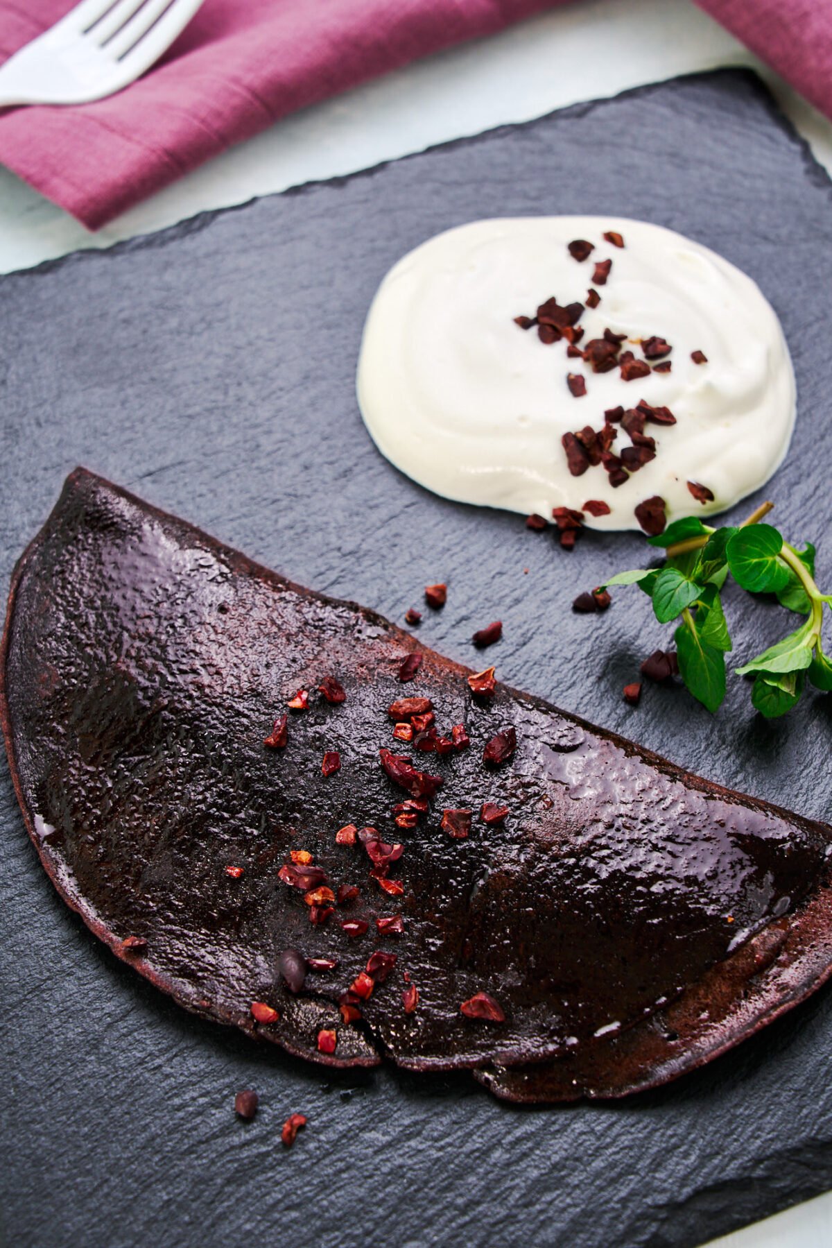 This decadent molten chocolate omelette is an easy stovetop dessert that comes together in under 10 minutes.