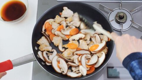 Add the shiitake mushrooms and stir-fry.