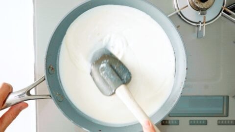 Making white béchamel sauce.