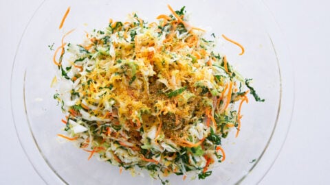 Fennel pollen and lemon dressing on cabbage, carrot and kale coleslaw.