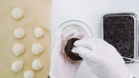 Stuffing ohagi with mochi rice.