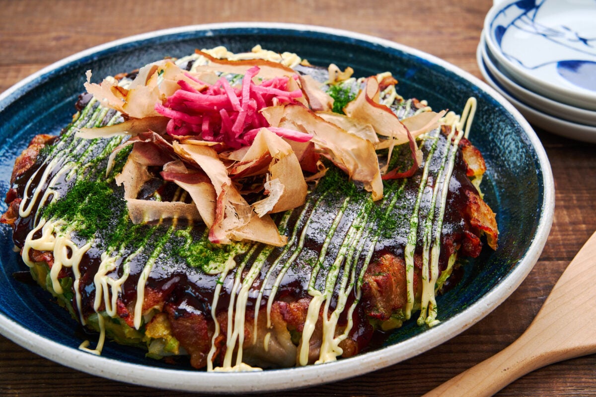 This savory Japanese cabbage pancake is called Okonomiyaki and can be made with whatever fillings and toppings you like.