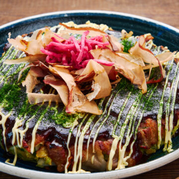 This savory Japanese cabbage pancake is called Okonomiyaki and can be made with whatever fillings and toppings you like.