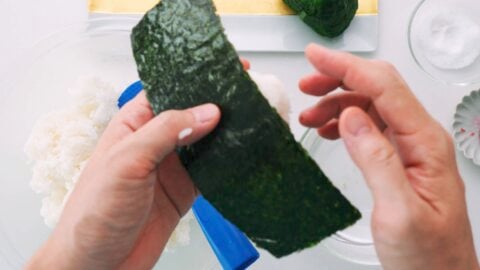 Wrapping Japanese Rice Ball with nori.