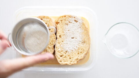 Dusting the Pain Perdu with flour and sugar before frying in butter ensures that's crisp.