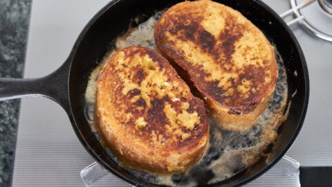 Golden crust on thick cut Pain Perdu (French Toast).