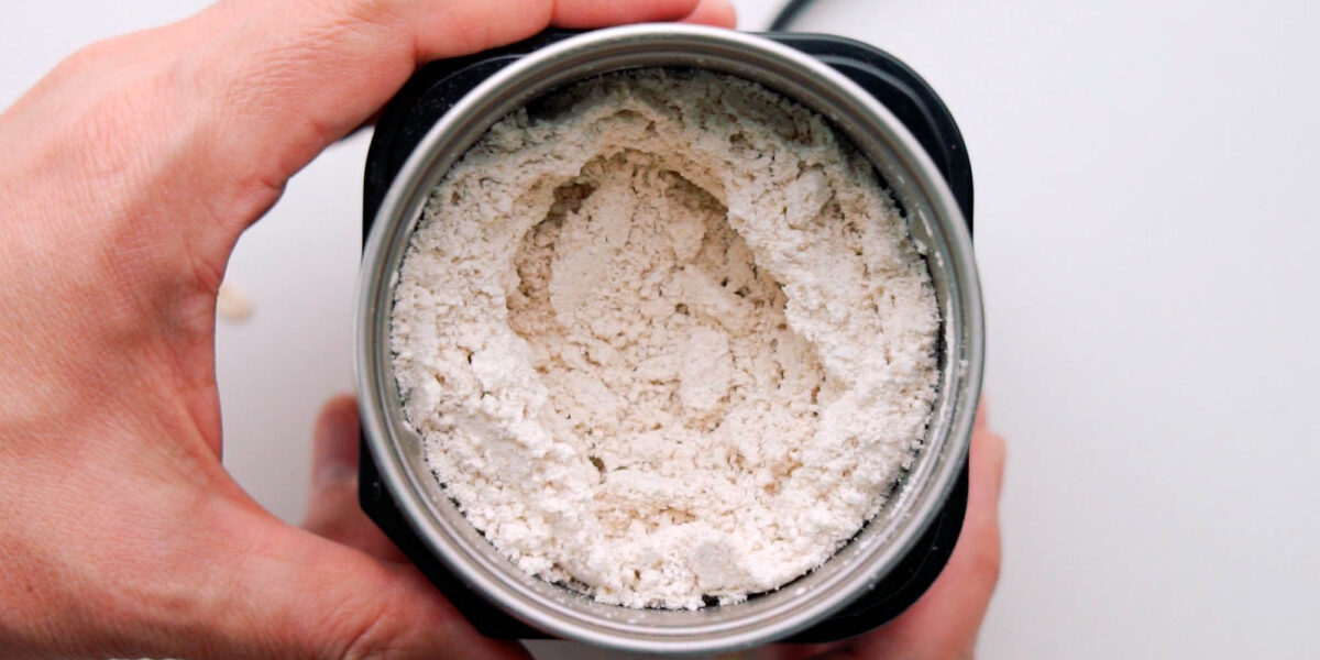 Grinding oatmeal into a flour for cookies