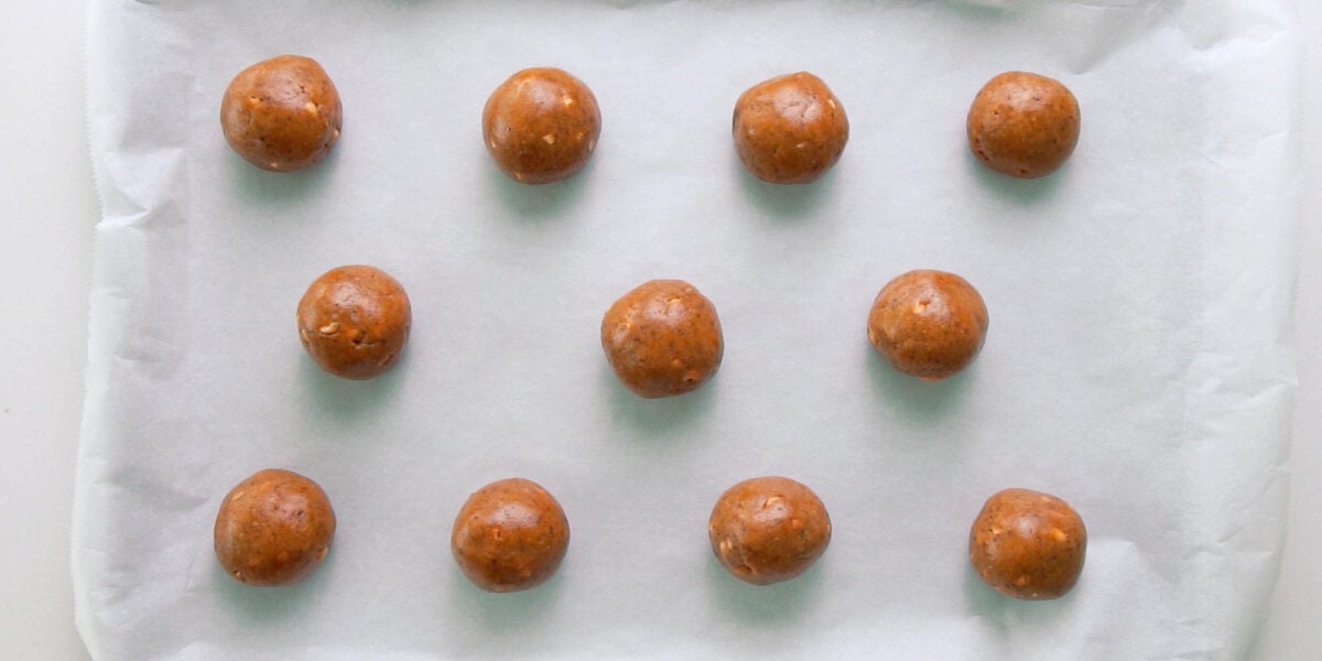 Peanut Butter Cookie balls on parchment paper. 