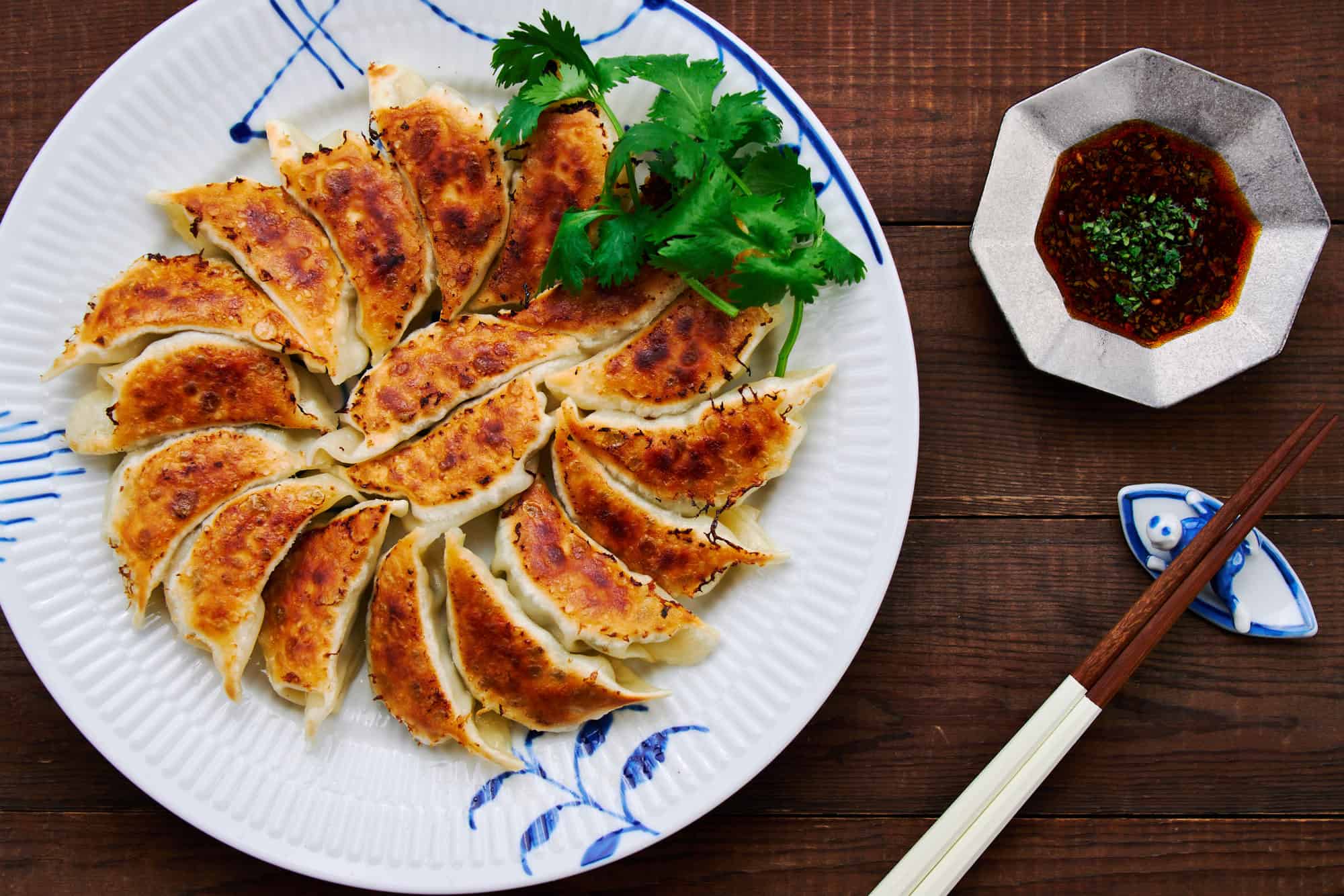 These Japanese gyoza highlight the tantalizing interplay between the crisp pan-fried wrapper and blissfully juicy pork and cabbage filling.