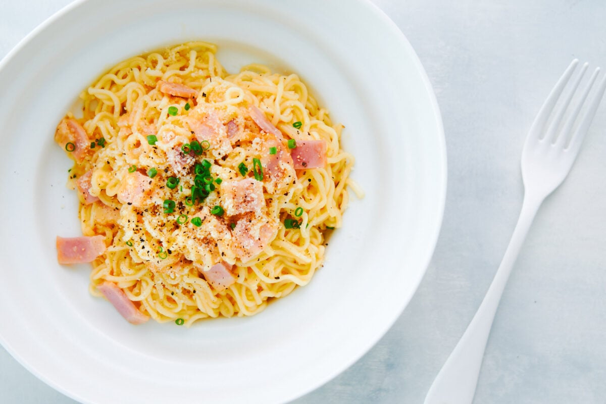 Instant ramen noodles tossed in rich and creamy carbonara sauce with bacon.