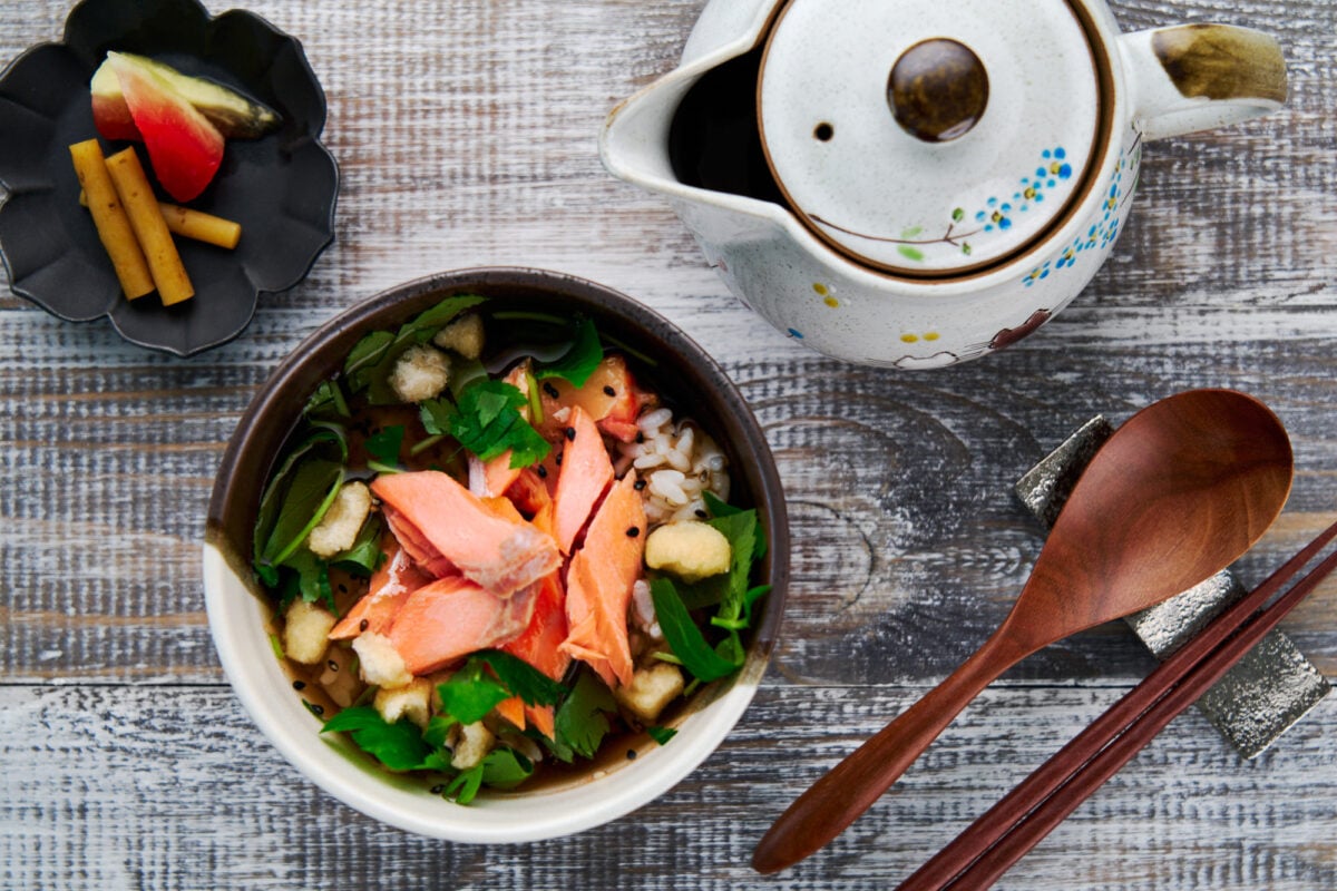 A traditional Japanese breakfast: Salmon Ochazuke, with watermelon and burdock pickles.