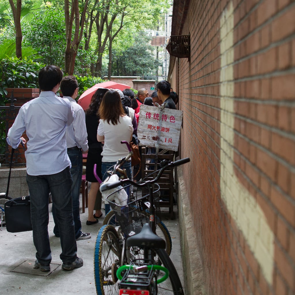 Standing in line to get scallion pancakes in Shanghai