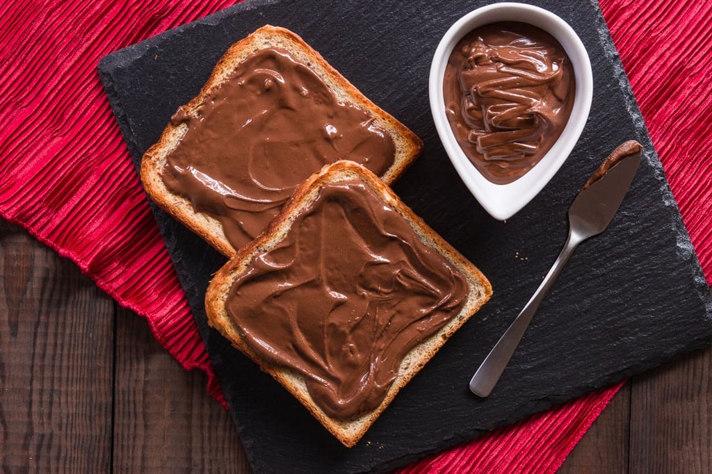 Sesamella is a like Nutella but with sesame instead of hazelnuts. This rich, chocolatey and delicious spread comes together from 4 ingredients in under 5 minutes.